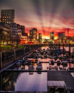 High angle view of river by buildings against sky