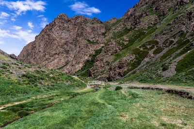 Scenic view of rocky mountains against sky