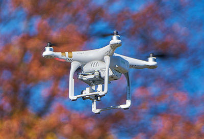 Low angle view of telephone pole against sky