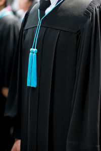 Close-up of graduation gown