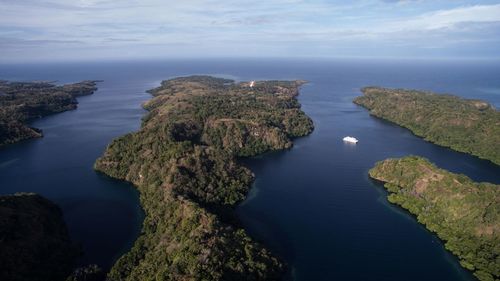 High angle view of tufi fjord by sea against sky