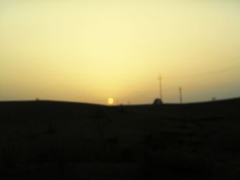 Scenic view of landscape at sunset