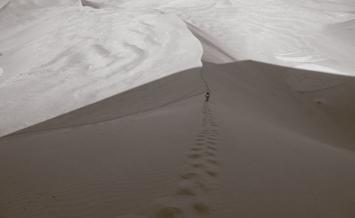 High angle view of sand dunes at beach