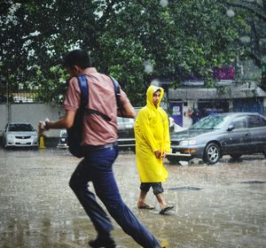 People on road in city