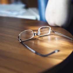 Close-up of eyeglasses on table