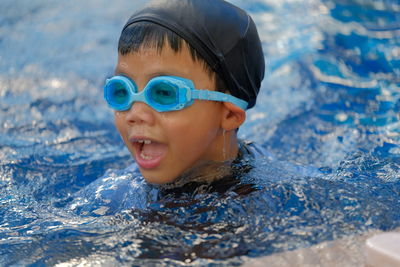 Close-up of boy in swimming pool