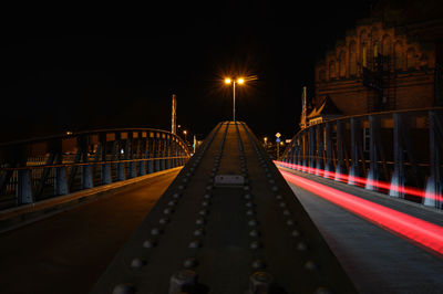 View of illuminated bridge at night