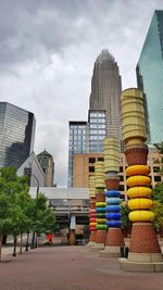 Low angle view of buildings against sky in city