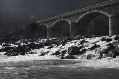 Arch bridge over river