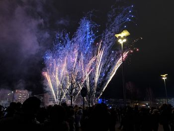 Firework display at night