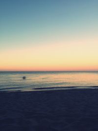 Scenic view of sea at sunset