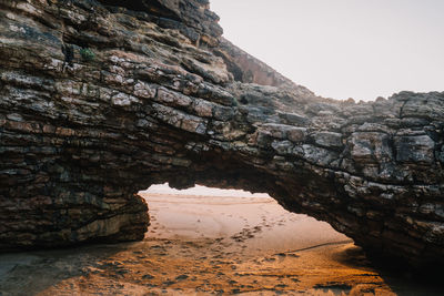 Scenic view of cliff against sky