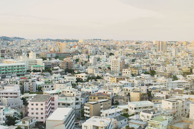 It is a cityscape from the top of naha city in okinawa