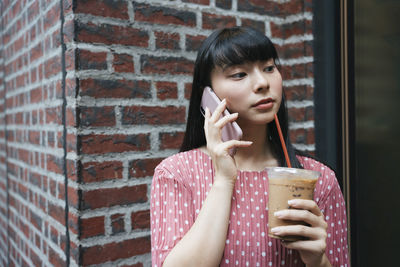 Portrait of a woman drinking glass