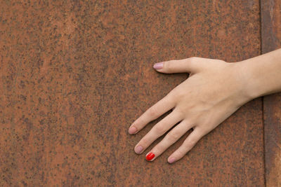 Low section of woman feet on floor