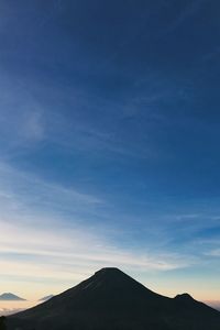 Scenic view of silhouette mountain against sky during sunset