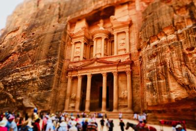 Group of people in front of historical building