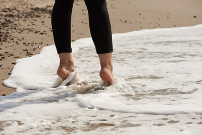 Low section of man on beach