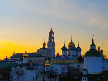 View of buildings against sky during sunset