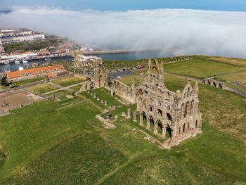 High angle view of old ruins against sky