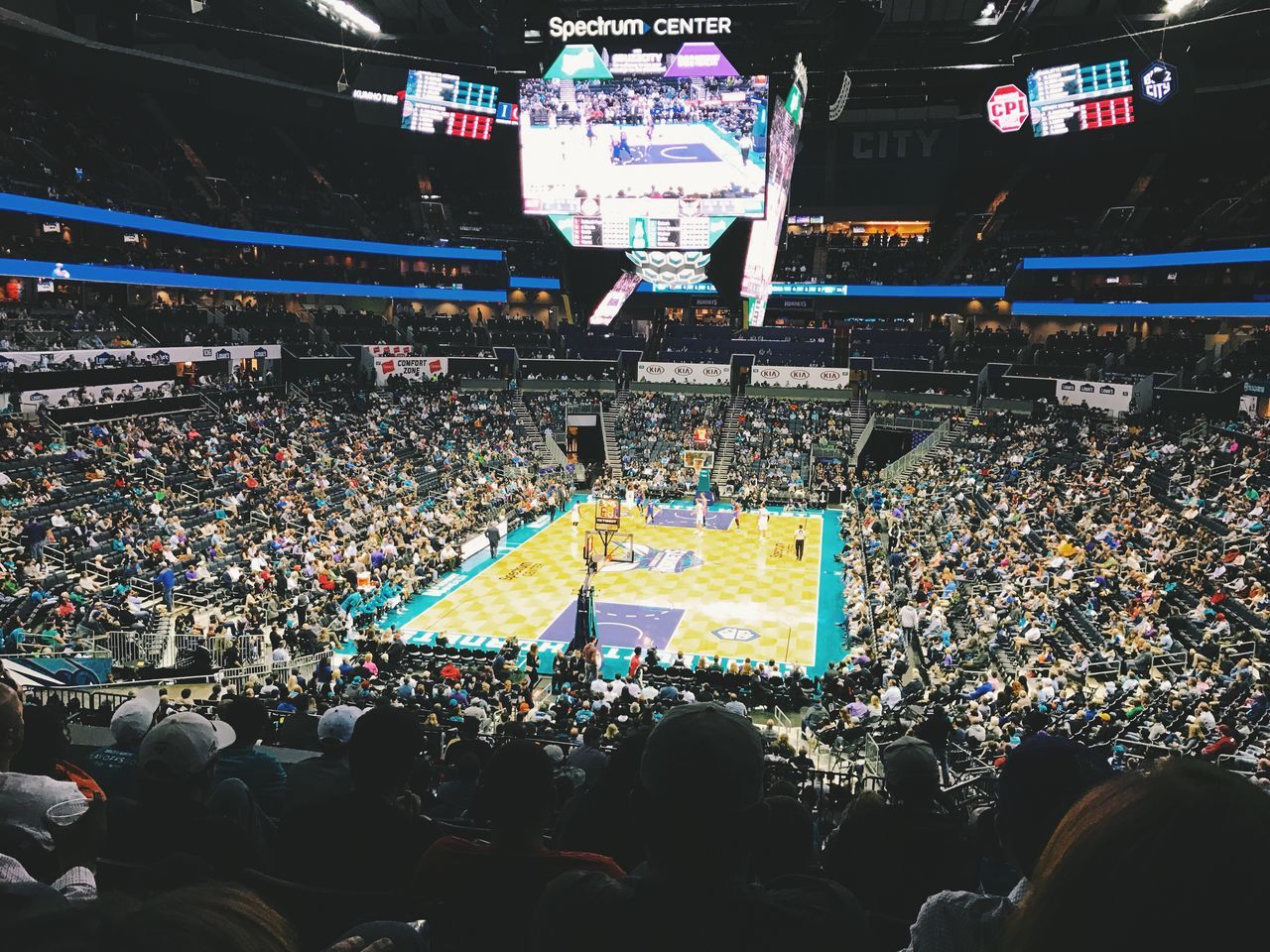 GROUP OF PEOPLE IN STADIUM