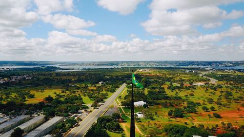 High angle view of trees and buildings against sky