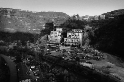 High angle view of buildings in city against sky