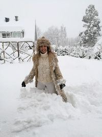 Man standing on snow field during winter