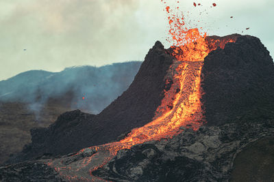 Panoramic view of volcanic landscape against sky