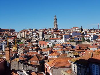 Cityscape against clear blue sky