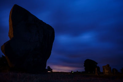 Silhouette of rock formations at dusk