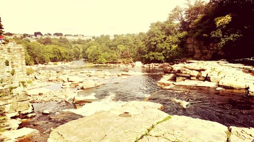 Scenic view of river against sky