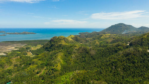 The mountains and hills with tropical forest with blue sea. tropical landscape, mindanao