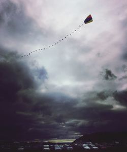 Low angle view of airshow against sky