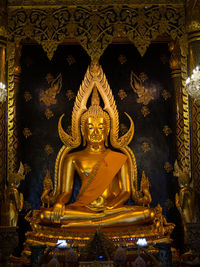 Statue of buddha in building