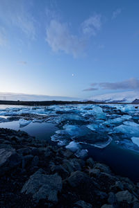 Scenic view of frozen sea against sky