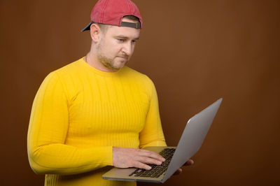 Young man using mobile phone