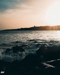 Scenic view of sea against sky during sunset