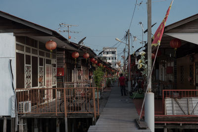 Pathway amidst cottages