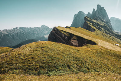 Scenic view of mountain range against clear sky