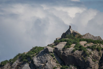 Low angle view of mountain range against sky