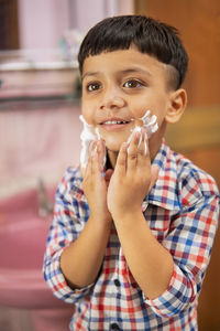 Portrait of cute boy smiling