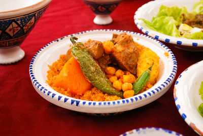 High angle view of meal couscous served in plate