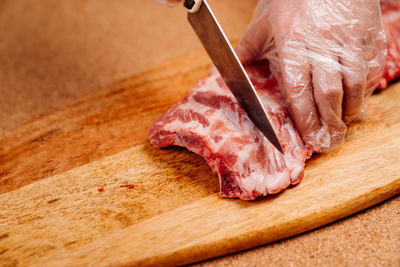 Close-up of meat on cutting board