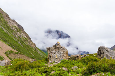 Scenic view of rock formations against sky