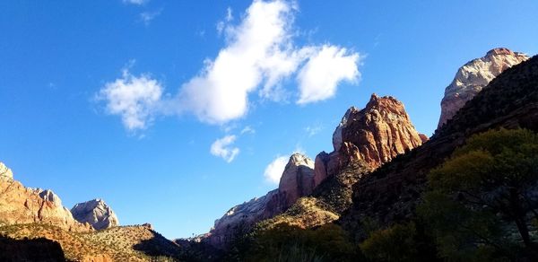 Low angle view of rocks against sky