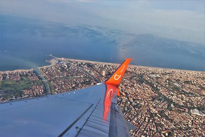 Aerial view of cityscape against sky