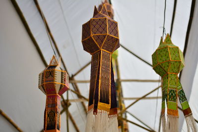 Low angle view of lanterns hanging from ceiling