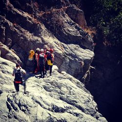 Low angle view of people on mountain