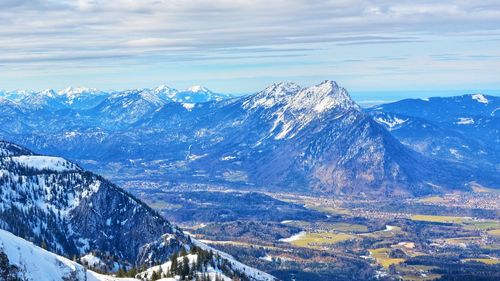 Scenic view of snowcapped mountains against sky